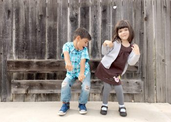 Dancing for joy. Two children
